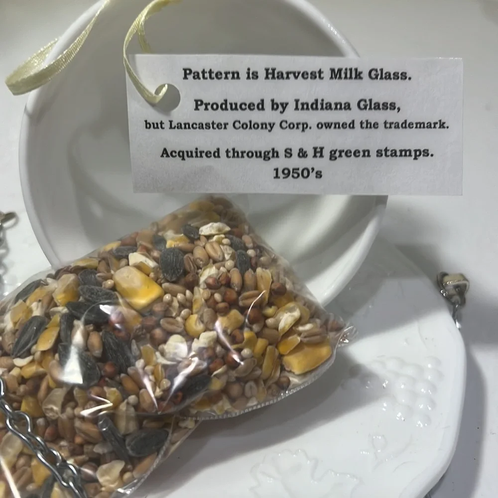 Cup and saucer bird feeder, created from vintage glassware